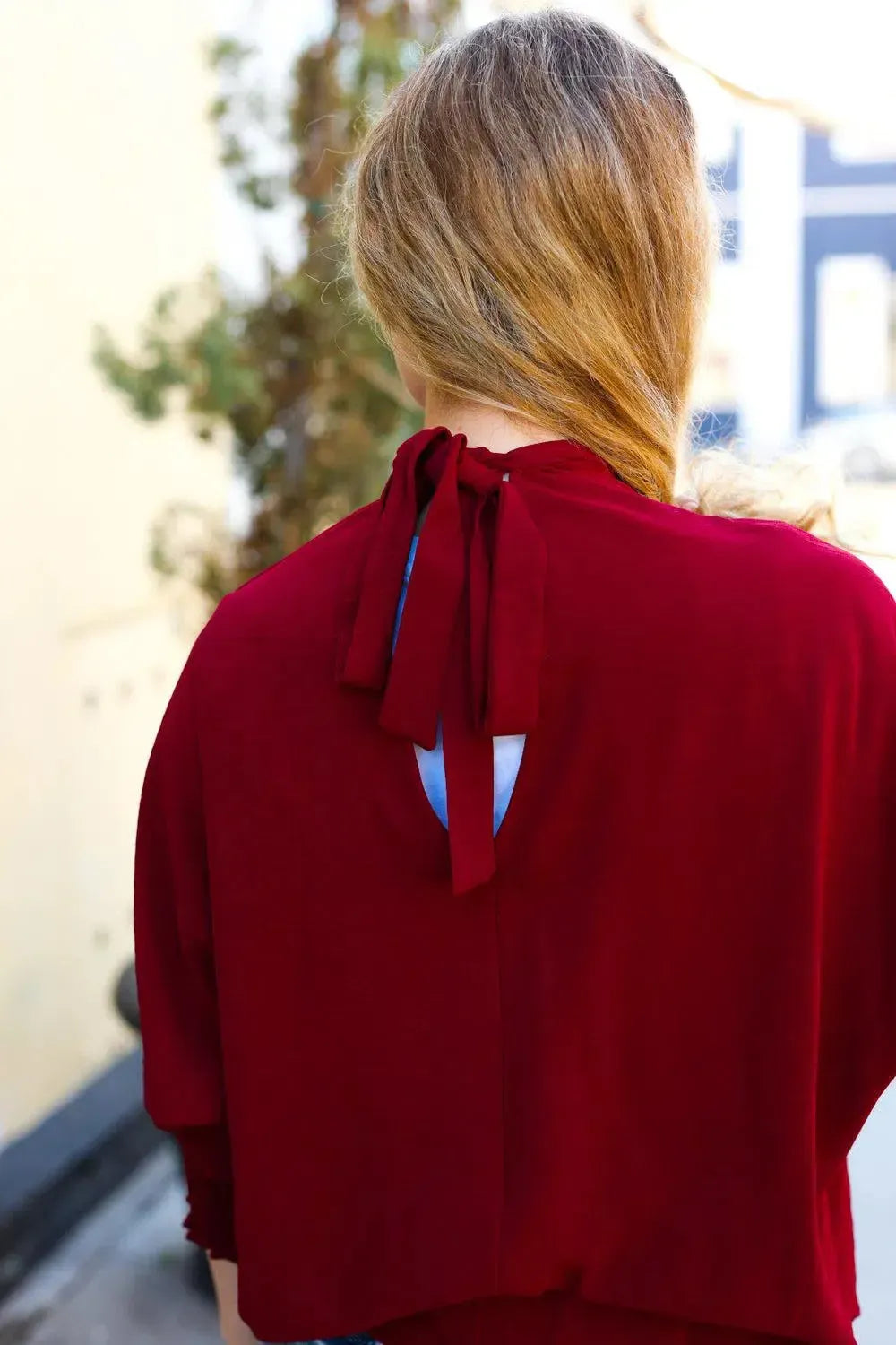 Effortless Elegance: Bold Dreams Wine Smocked Tie Back Top-Evelyns Fashion