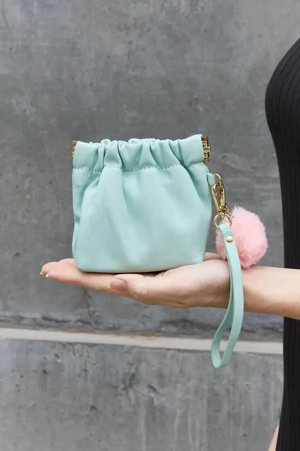 Sleek and Functional: Premium Leather Pouch-handbags-Evelyns Fashion