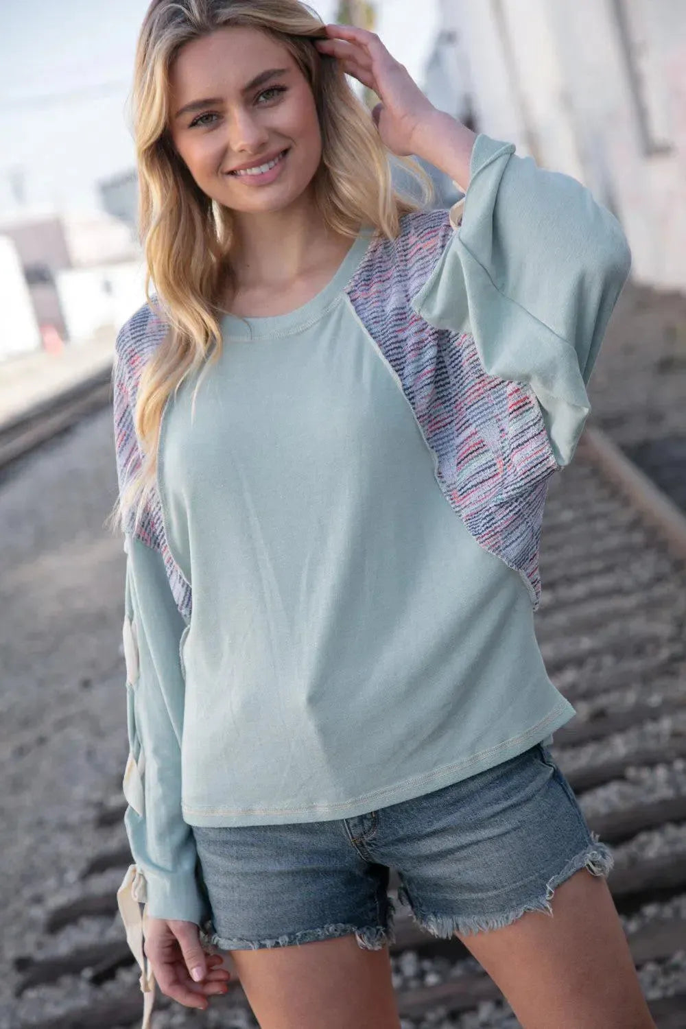 Trendy Comfort: Mint Lace Up Oversized French Terry Pullover-Evelyns Fashion